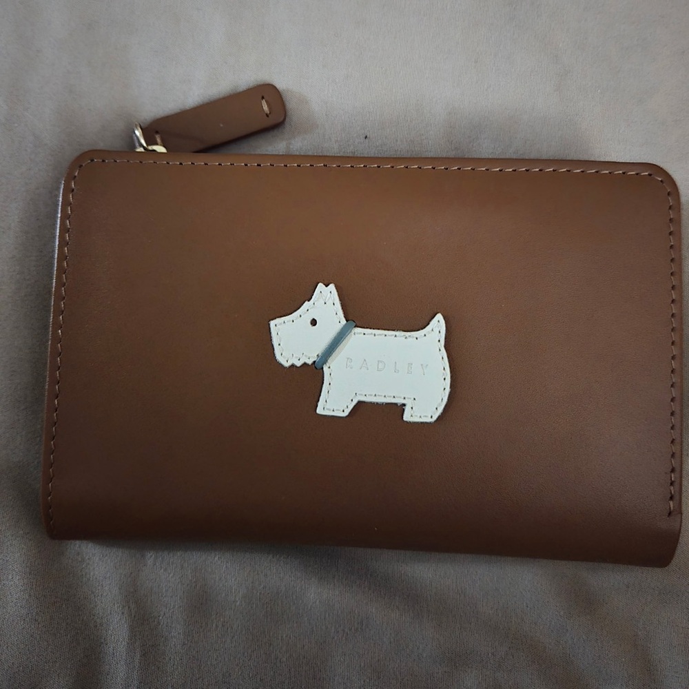 Radley Brown Wallet with Dog Logo New without tag. 5-1/2x3-1/2